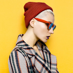 Autumn Winter hipster style. Fashionable girl in accessories hat