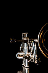 trumpet, wind instrument / lonely musical instrument which is a trumpet on a black background
