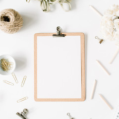 Flat lay, top view office table desk. feminine desk workspace mock up with clipboard, twine,...