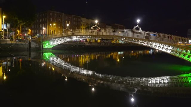 The Ha Penny Bridge with the lights on at night. The Ha penny Bridge known later for a time as the Penny Ha penny Bridge and officially the Liffey Bridge is a pedestrian bridge built in May 1816 