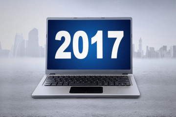 Laptop with number 2017 in the outdoors