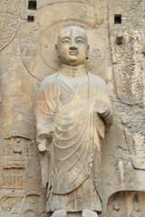 Fototapeta na wymiar Buddha's statue rock carving in Longmen Grottoes, Luoyang, China