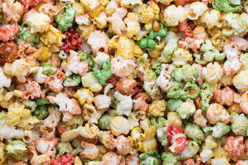 Colored Popcorn texture background. Sweet popcorn.