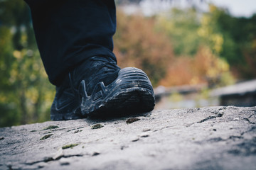 The shoe on the pavement