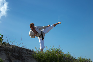 Man practicing a kick