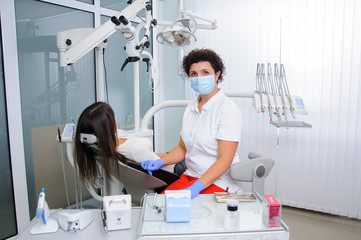 Dentist in a dental clinic