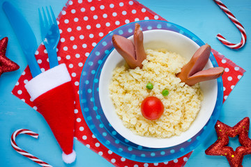 Creative idea for kids Christmas food - couscous with vegetables
