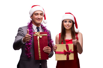 Pair celebrating christmas in the office isolated on white