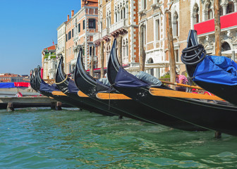 Fototapeta na wymiar Row of venetian gondolas