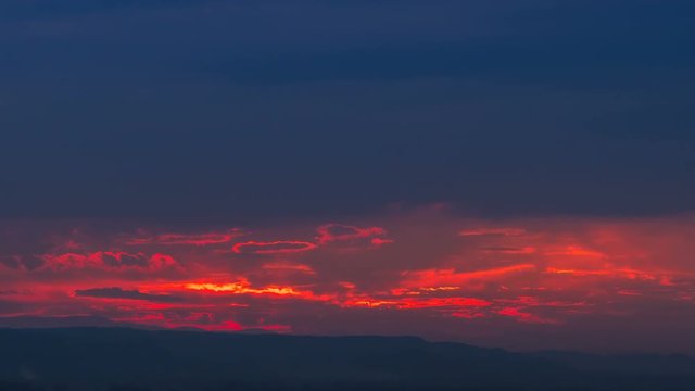 The sunset (sunrise) varicolor cloud above hill