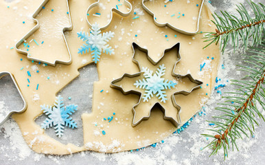 Christmas cookie preparation - raw dough, christmas tree branch