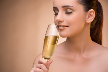 Young woman with champagne glass