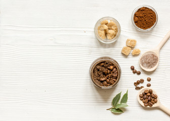 homemade coffee-sugar scrub top view wooden background