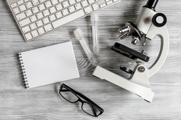 lab assistant desk with microscope top view