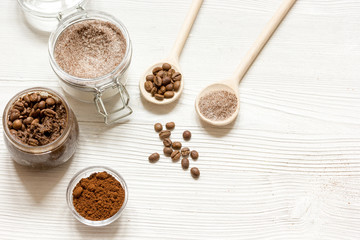 homemade coffee-sugar scrub top view wooden background