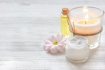 Fototapeta na wymiar spa nail care with aroma candle on wooden background