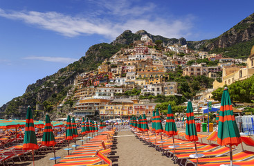 Summertime seascape. Amalfi coast: Positano beach: the skyline of the town. Italy (Campania).