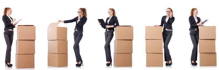 Businesswoman with boxes isolated on white