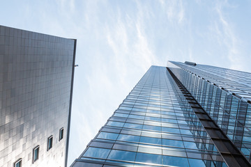 Fototapeta na wymiar View from below of towering buildings in a financial district.