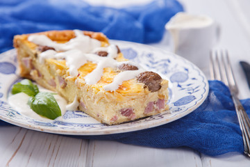 Quiche  Lorraine,a Traditional French Savoury an open Pie with Bacon and Mushrooms.selective focus.