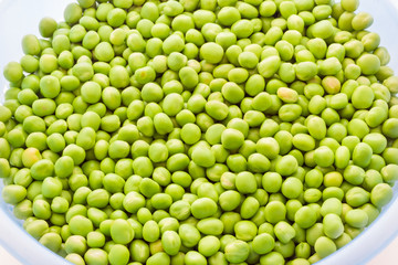 Fototapeta na wymiar Bunch of biologic delicious green peas