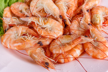 Baked butter shrimp on white dish