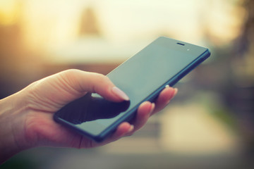 Female using modern smartphone