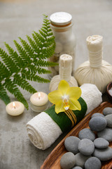 Composition of bath spa treatment on gray background