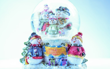 Merry Christmas toy snowmen figurines family on white background