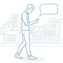 Man walking with smartphone in the city street