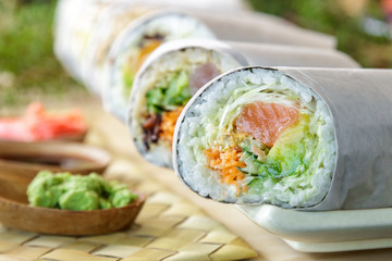 japanese sushi burrito roll served with wasabi