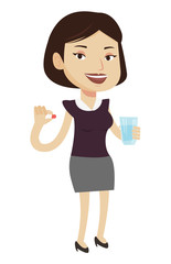 Young caucasian woman taking pills.