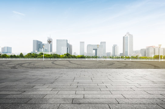 cityscape and skyline of nanjing from empty brick floor