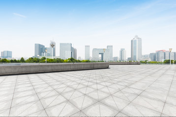 cityscape and skyline of nanjing from empty brick floor