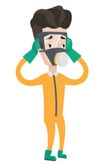 Man in radiation protective suit.