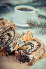 Vintage photo, Poppy seeds cake, cup of coffee and spruce branches, dessert for Christmas