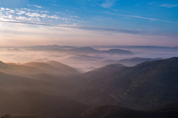 Fototapeta na wymiar Misty hills in the morning