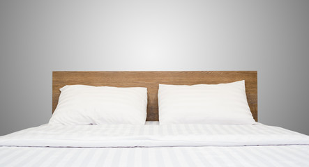 Fototapeta na wymiar white bedding and pillow in hotel room
