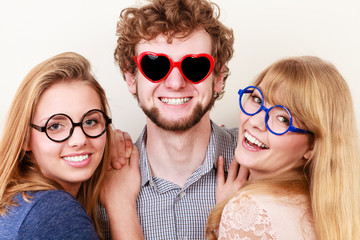 Happy friends man and women in glasses.