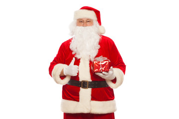 Santa Claus: Cheerful With Small Stack Of Gifts big bag, isolated on white background Christmas.