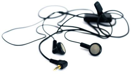 Audio earphones over white