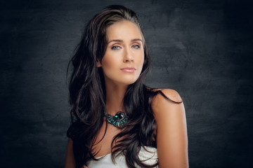 Brunette female in white bra.