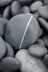 Rounded pebbles at the tropical beach