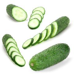 Green cucumbers on a white background