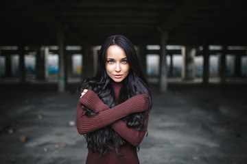 Fototapeta premium portrait of a girl in pullover urban style