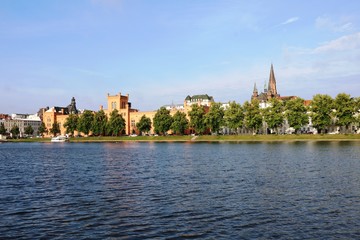 Naklejka premium Pfaffenteich in Schwerin, view to Paul Church and Interior Ministry, Mecklenburg Germany 