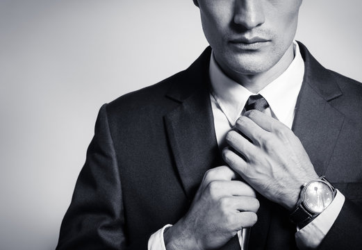 Well Dressed Businessman Wearing Suit Tie And Watch. 