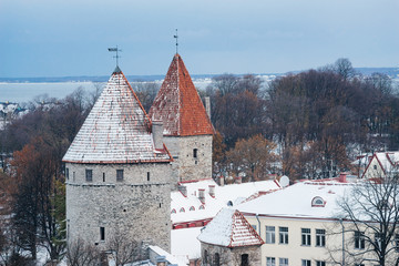 Historical roofs of wintry Tallinn old town © alexpolo