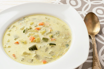 Vegetarian soup with zucchini, carrot and potatoes.