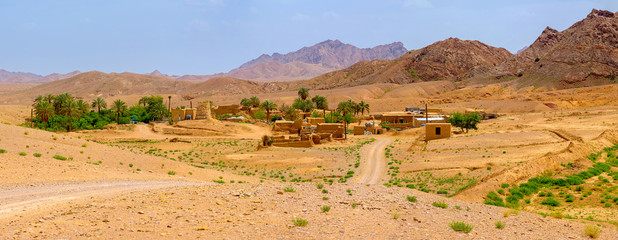 pise-walled village in the desert area of Iran